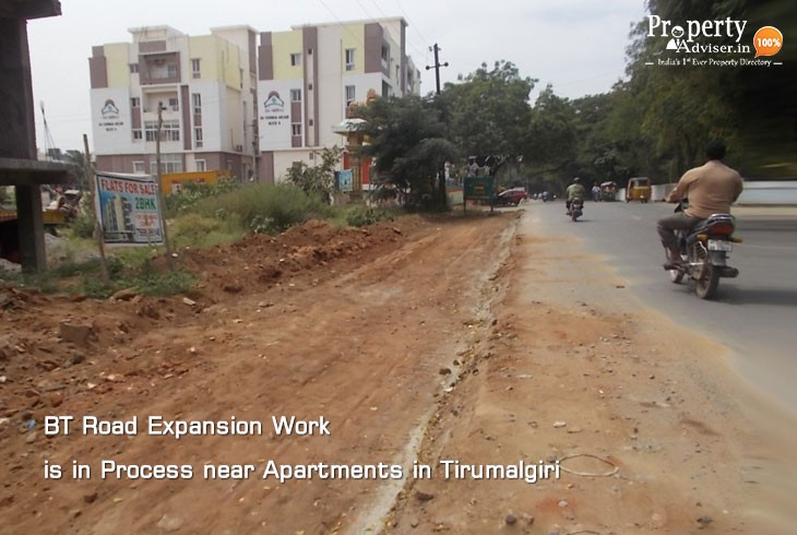 BT Road Widening near Apartments in Tirumalgiri