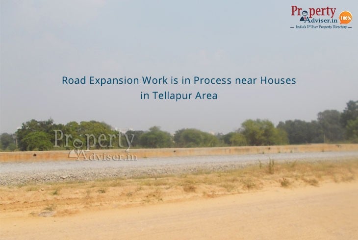 Road Expansion Work Is In Process Near Houses In Tellapur Area