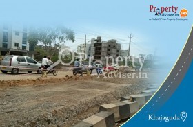 Road Extension Work is in Progress near Residential Apartments at Khajaguda