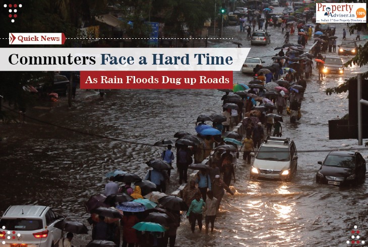 Commuters face a hard time as rain floods dug up roads